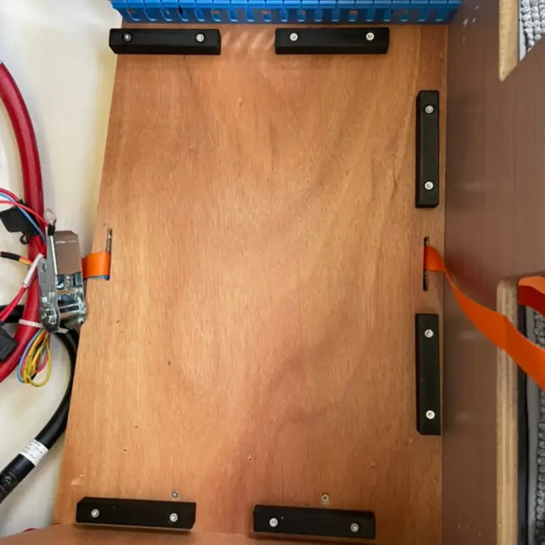 3D printed ABS battery case support brackets.